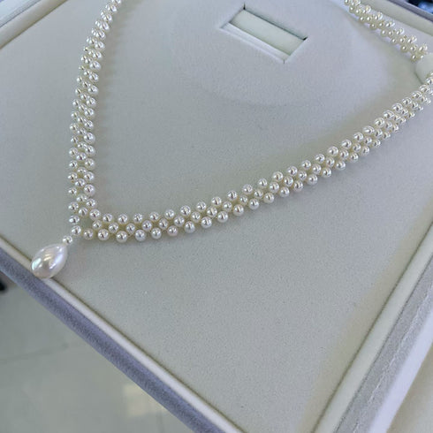 Teardrop of Stars Layered Pearl Necklace – Elegant Handwoven Design