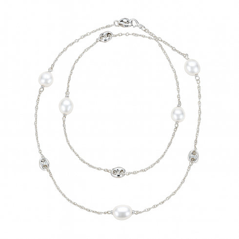 Two-layered pearl necklace on a white background